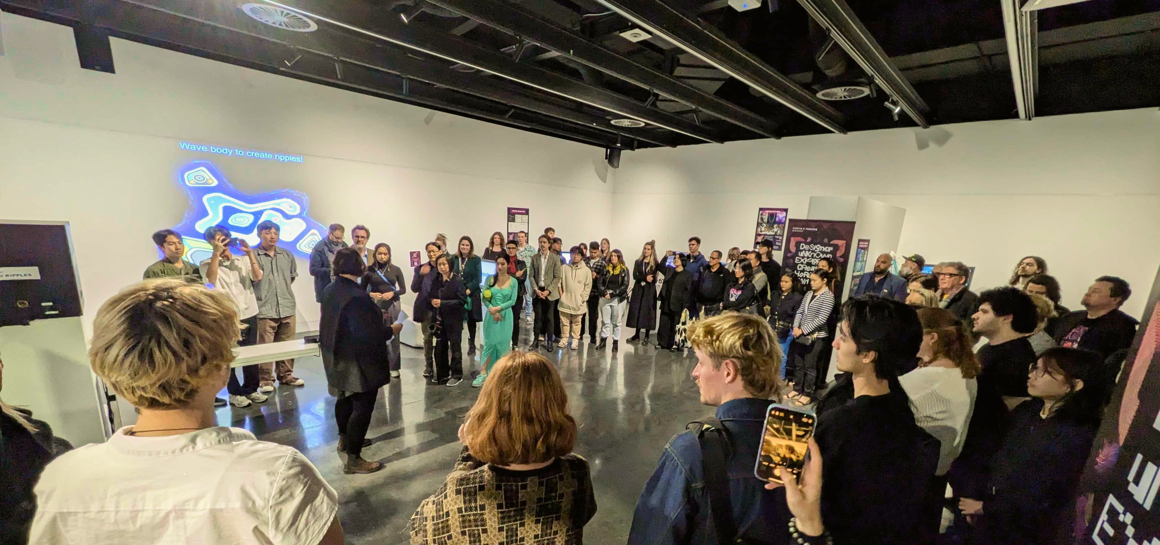 image of a crowd at Designer Unknown exhibtion